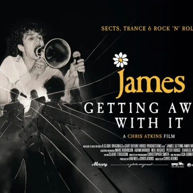 Poster for the film James: Getting Away With It, showing a male singer with a microphone and a cracked-glass motif, with the title in bold white lettering and a daisy graphic above 'James'.